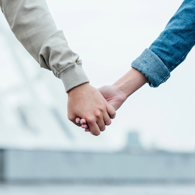 couple holding hands